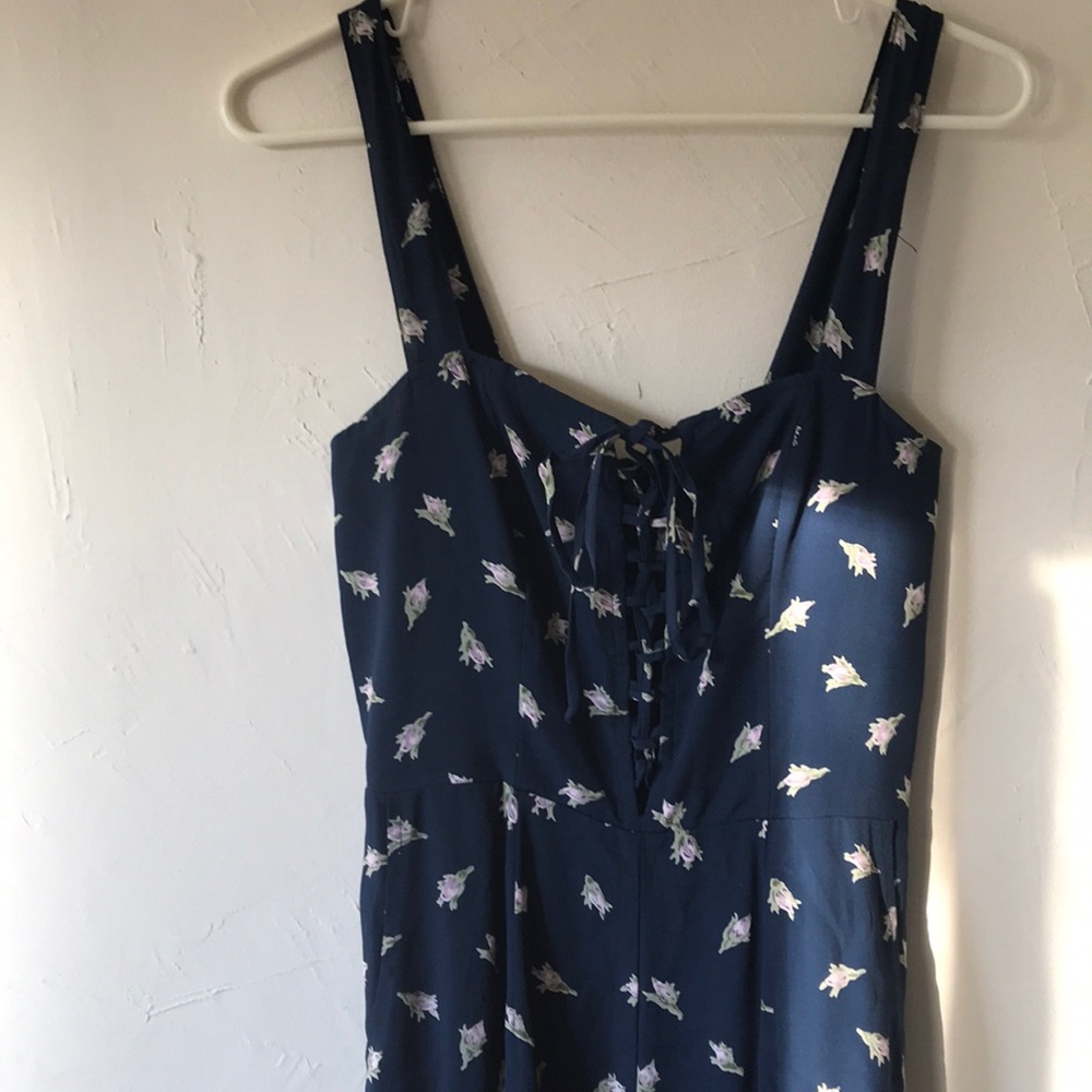 Flynn Skye blue floral jumpsuit sz med tie front